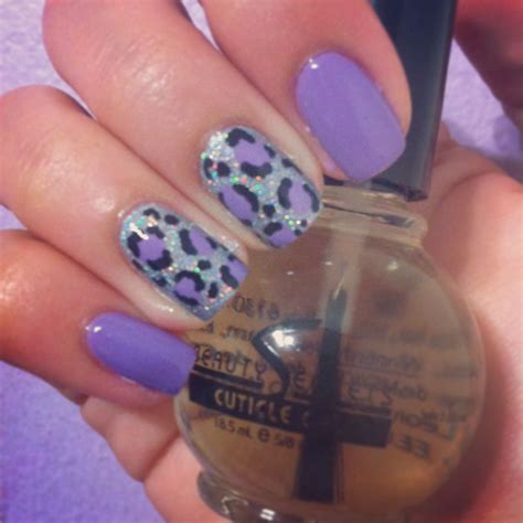 purple cheetah print nails.